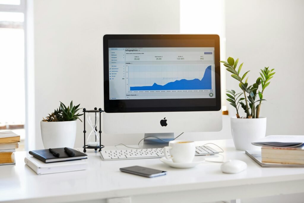 A graph on a monitor in an upward trend