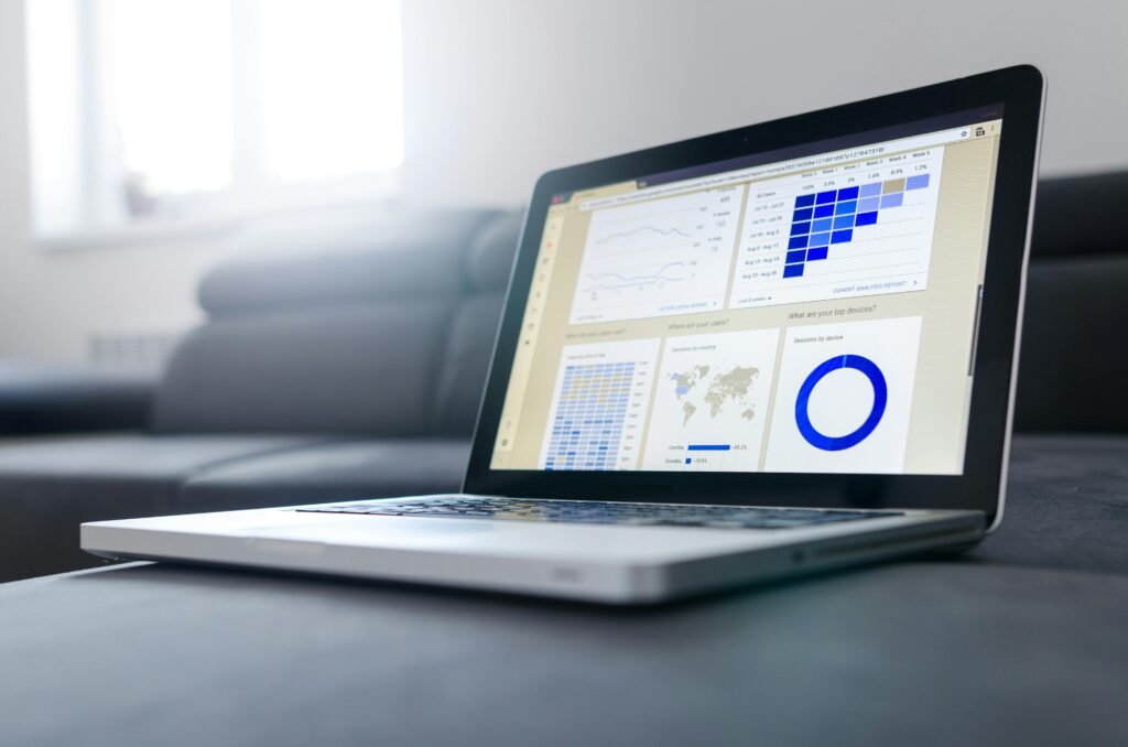 Laptop on a table with a page open on a dashboard